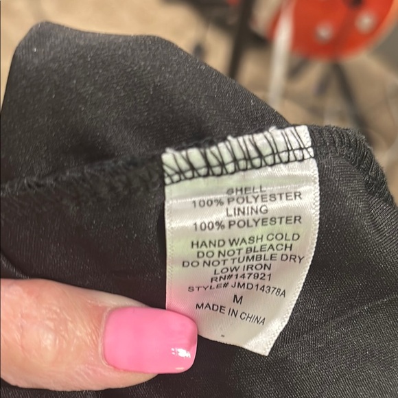 Make a gorgeous statement! 🔥Just Me Black Halter Neck Circle Fringe Dress - Picture 6 of 6